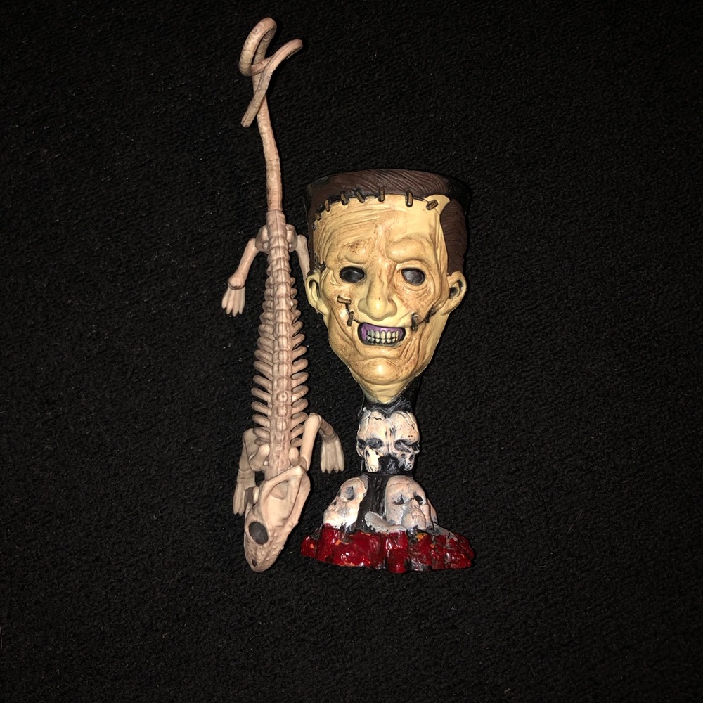 Leatherface and Lizard. Hard Plastic Goblet and Hard Plastic Bendable Figurine.